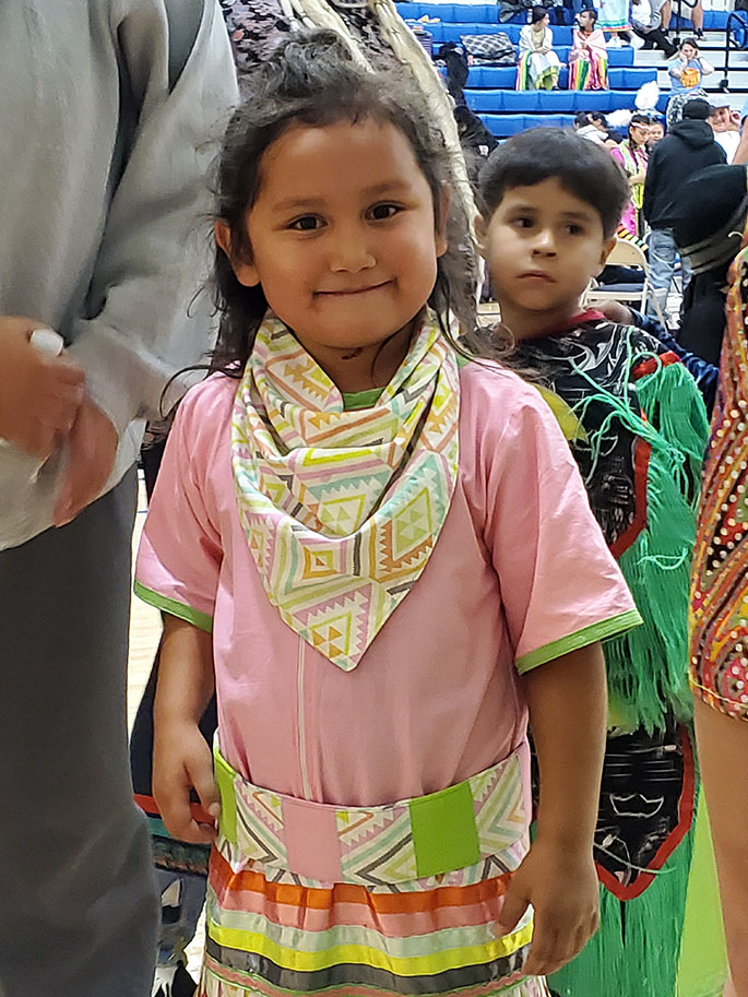 Student enjoying dancing at Powwow